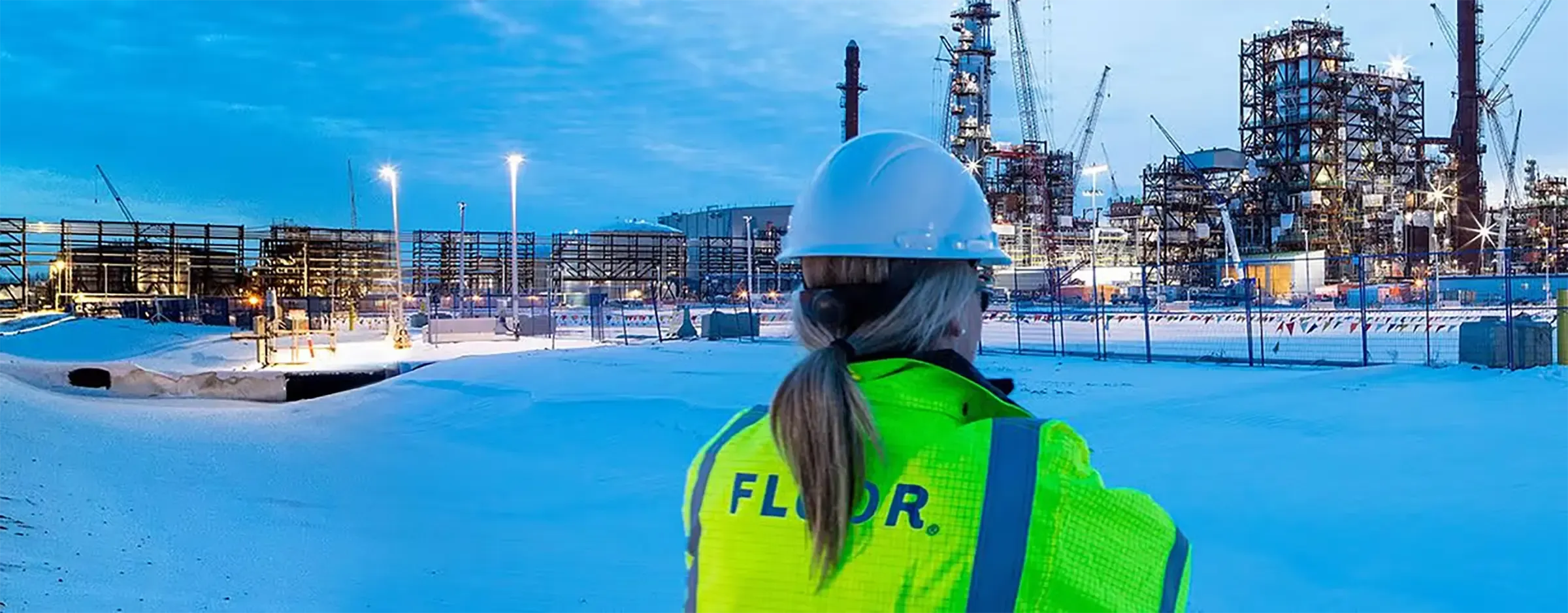 FLUOR: A busy construction scene at a large construction site.