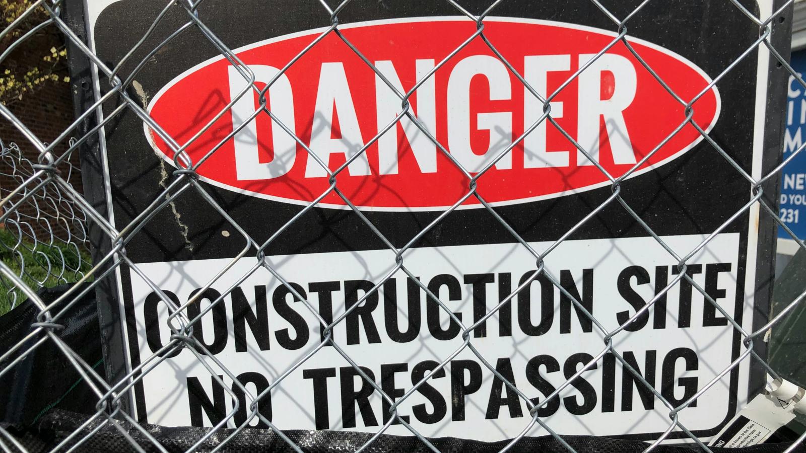 Danger signs on CONSTRUCTION SITE N0 TRESPASSING